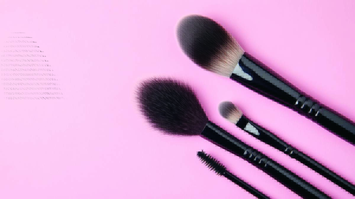 Professional Makeup Brushes Set On A Pink Background Perfect For